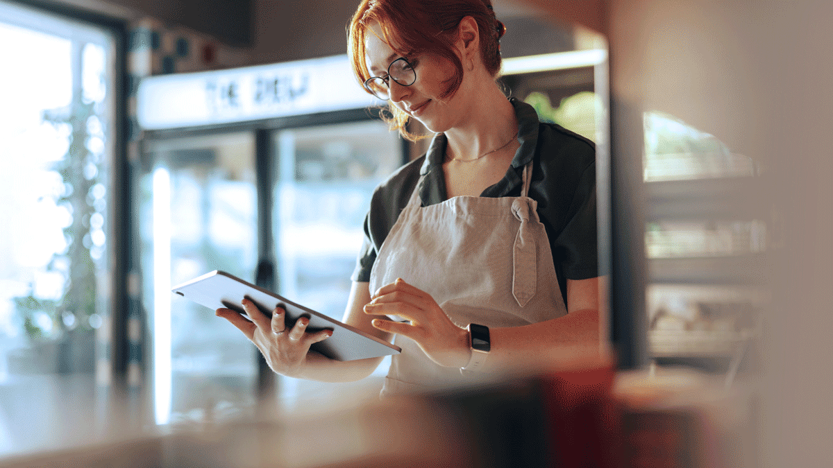 XYPN small business owner reviewing her company's finances