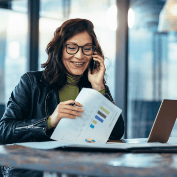 XYPN woman speaking on the phone with her financial planner