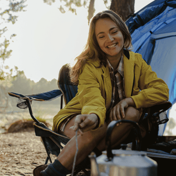 XYPN Woman camping in the redwoods